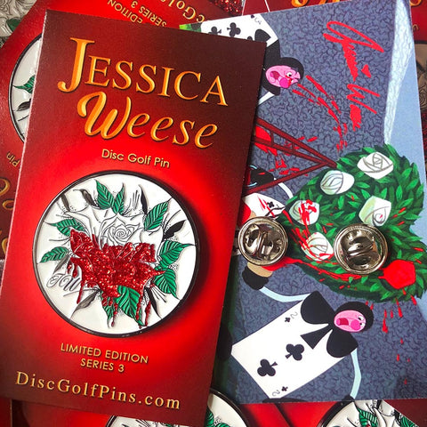 jessica weese disc golf enamel pin on red card with alice in wonderland imagery
