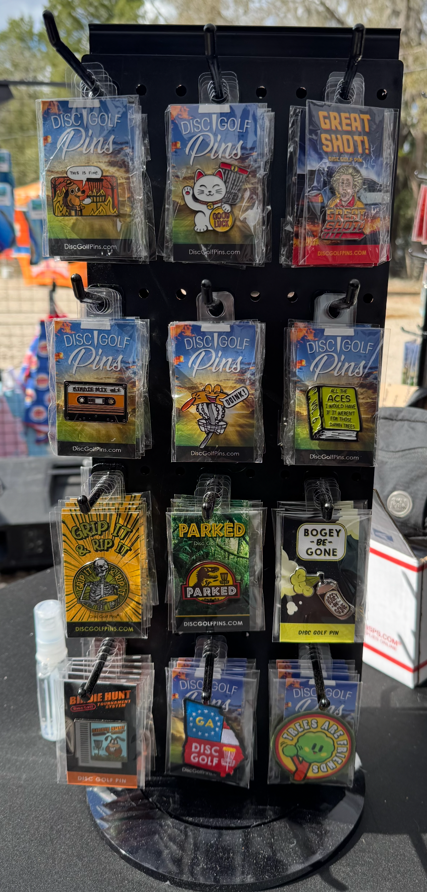 Disc Golf Pins double-sided spinner retail display with packaged pins